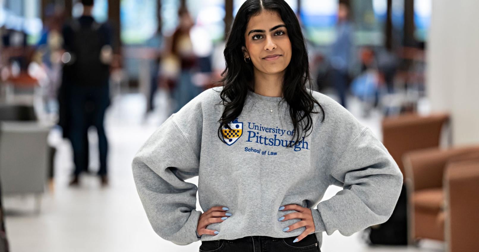 A Pitt law student poses for the camera.